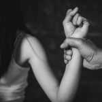 Men are violently assaulting their women, Husband beating and smothering wife during argument, Woman victim of domestic violence and abuse, Domestic violence concept.
